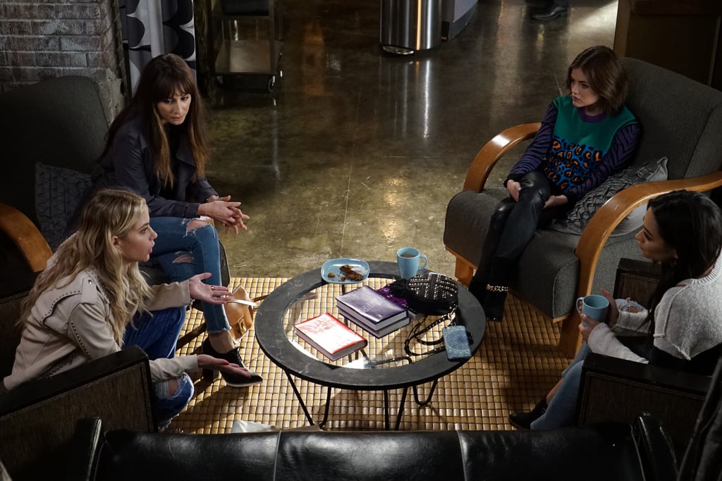 All the girls look cute, but we can't peel our eyes away from Aria's printed sweater and leather pants.