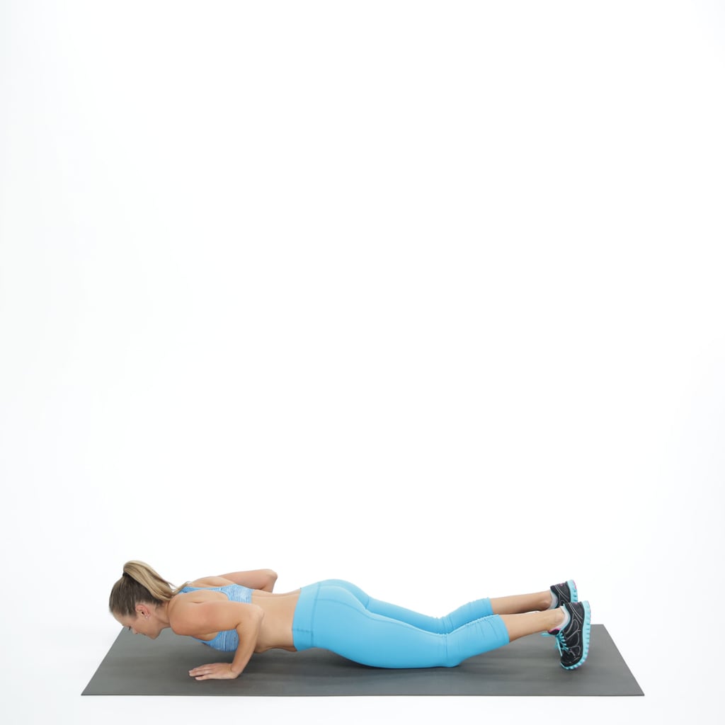 Bend your elbows, lowering your chest to the floor to do a push-up. 
