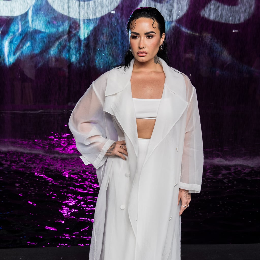 Demi Lovato Sits Front Row in a White Bra and Sheer Jacket