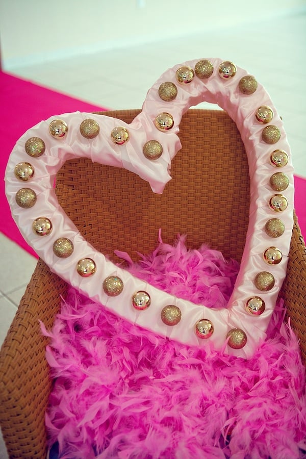 Use this heart-shaped marquee DIY to make your own cute photo booth prop.