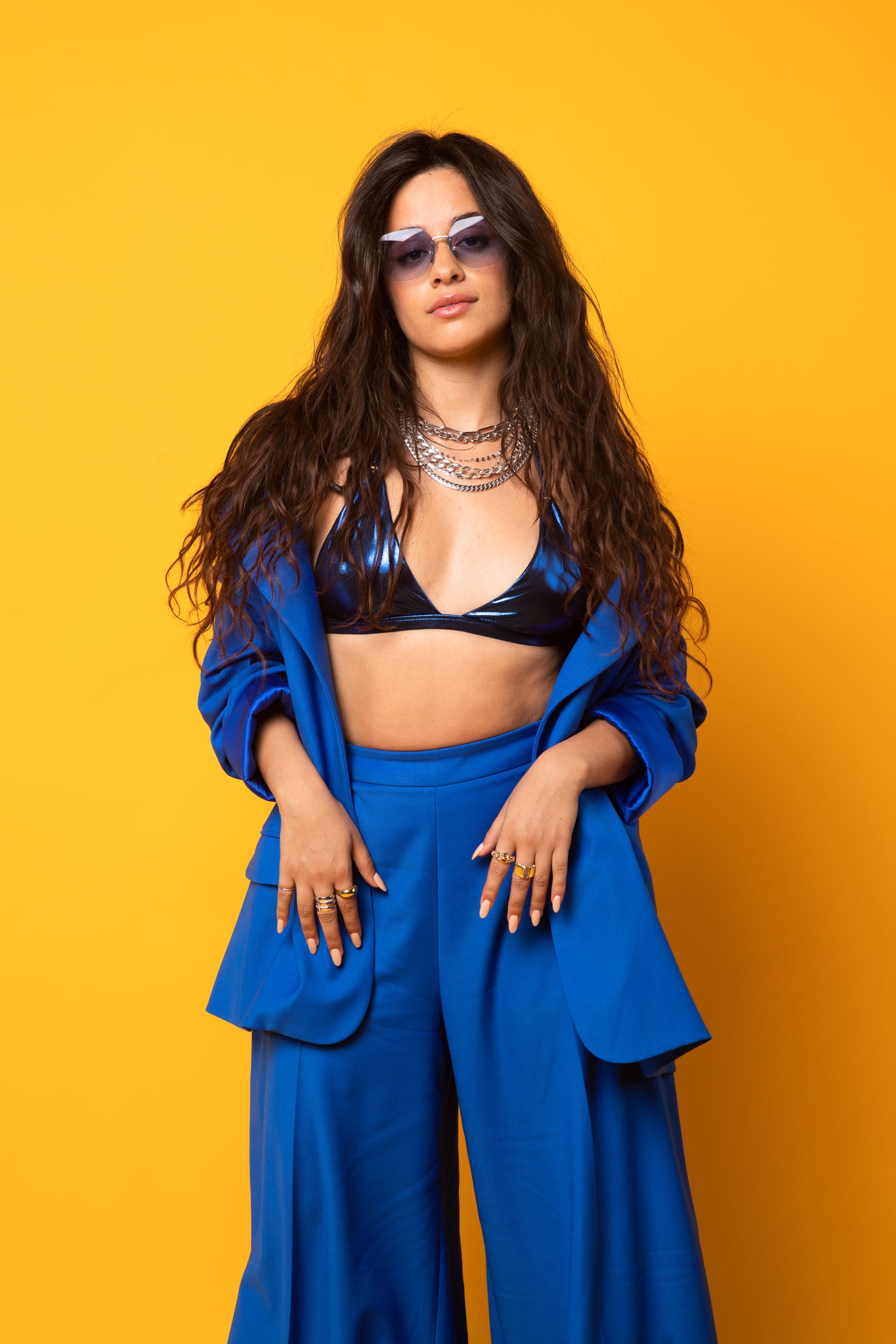 BIRMINGHAM, ENGLAND - MARCH 29: Camila Cabello poses backstage during a Concert for Ukraine at Resorts World Arena on March 29, 2022 in Birmingham, England. All proceeds from Concert for Ukraine are being donated to Disasters Emergency Committee's Ukraine Humanitarian Appeal. (Photo by Tristan Fewings/Disasters Emergency Committee/Getty Images for Livewire Pictures Ltd)