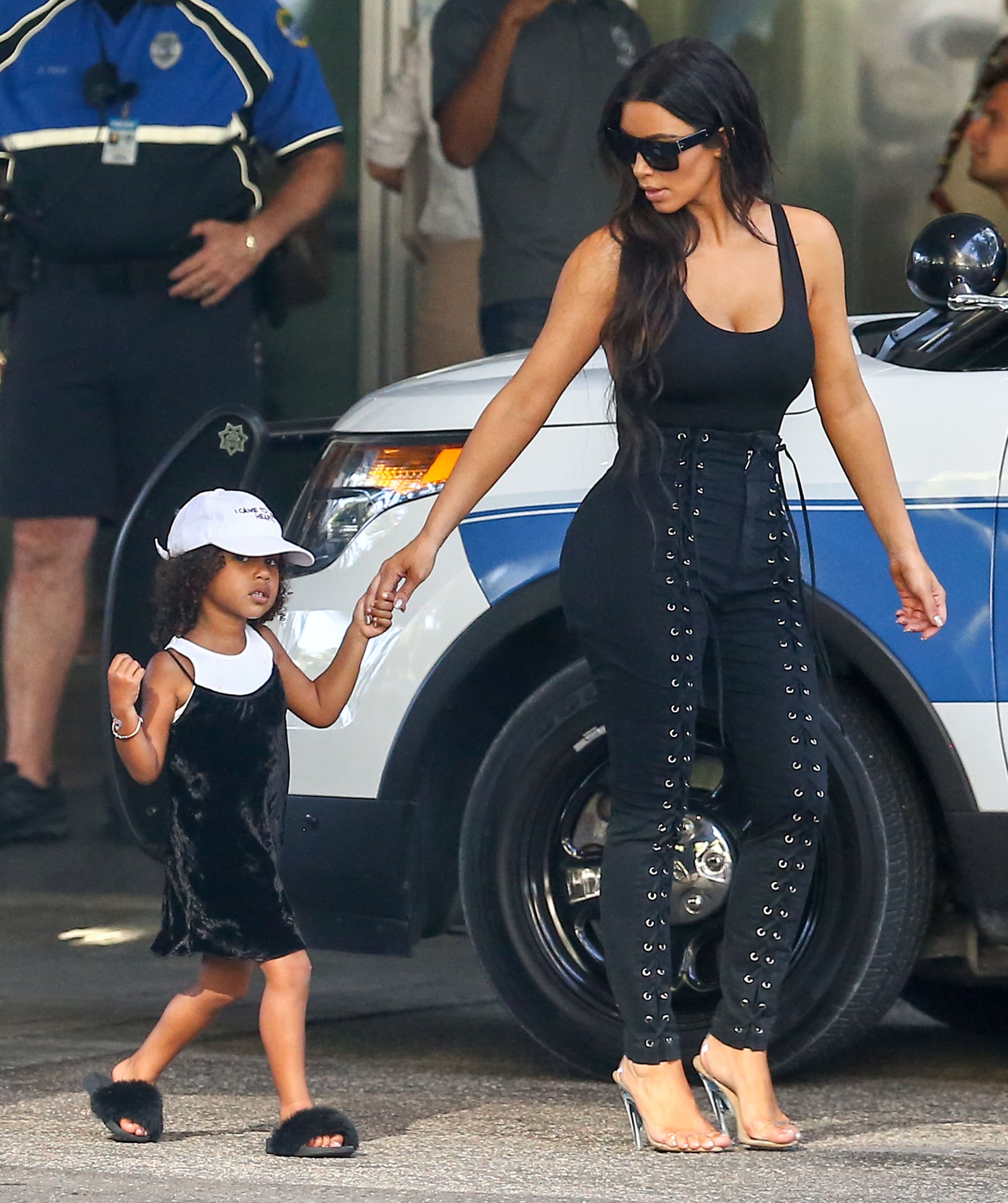 While Kim Kardashian Styled Her Lace Ups With A Simple Black Tank