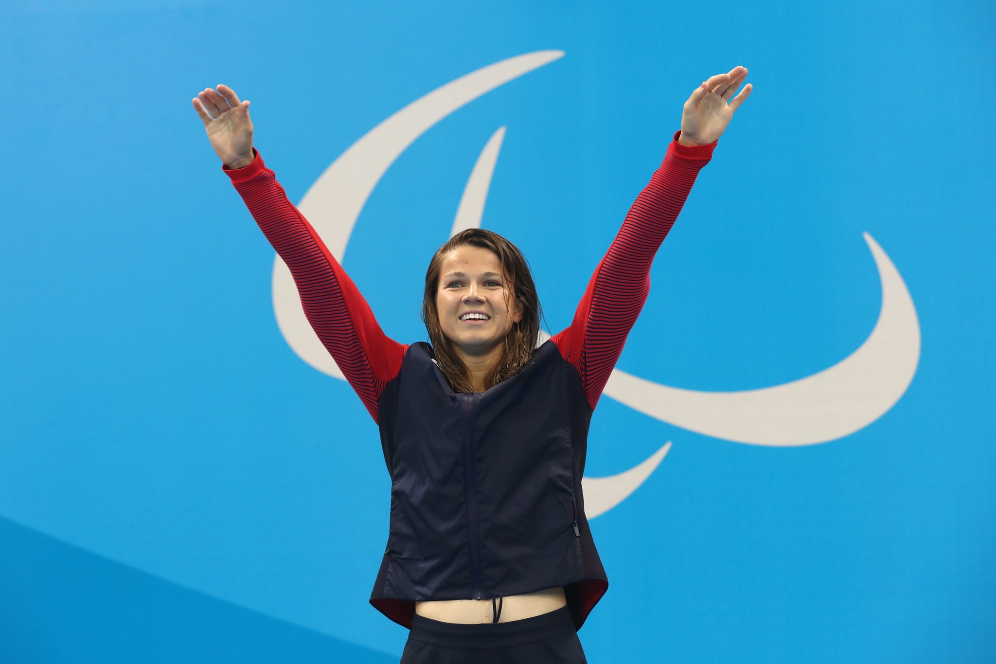 RIO DE JANEIRO, BRAZIL - SEPTEMBER 10:  Gold medalist Rebecca Meyers of the United States celebrates on the podium at the medal ceremony for the Women's 200m Individual Medley - SM13 Final on day 3 of the Rio 2016 Paralympic Games at the Olympic Aquatics Stadium on September 10, 2016 in Rio de Janeiro, Brazil.  (Photo by Buda Mendes/Getty Images)