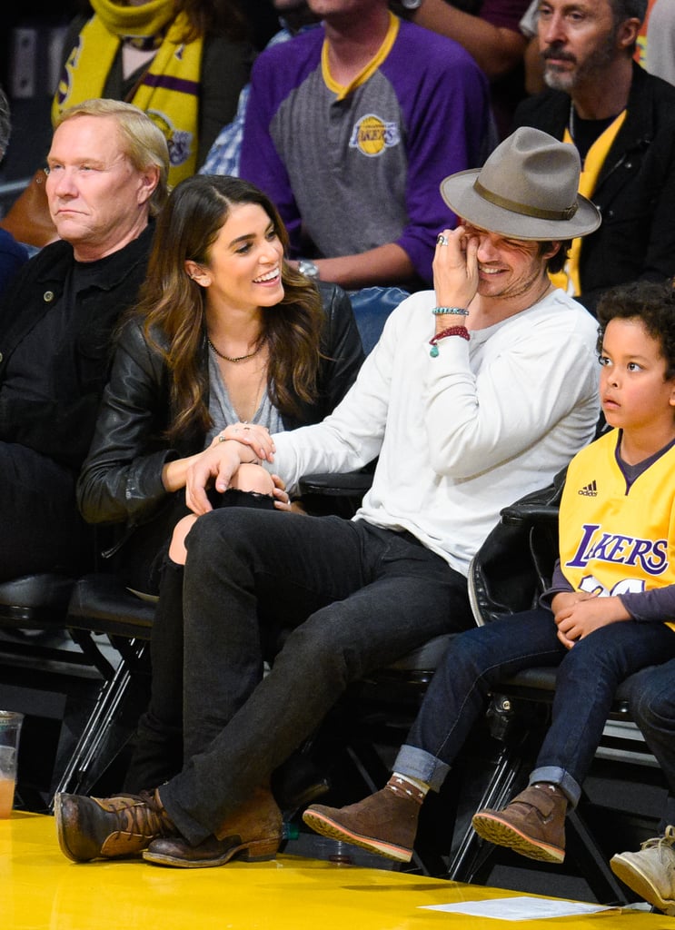 Nikki and Ian shared a laugh courtside at a December 2014 Lakers game.