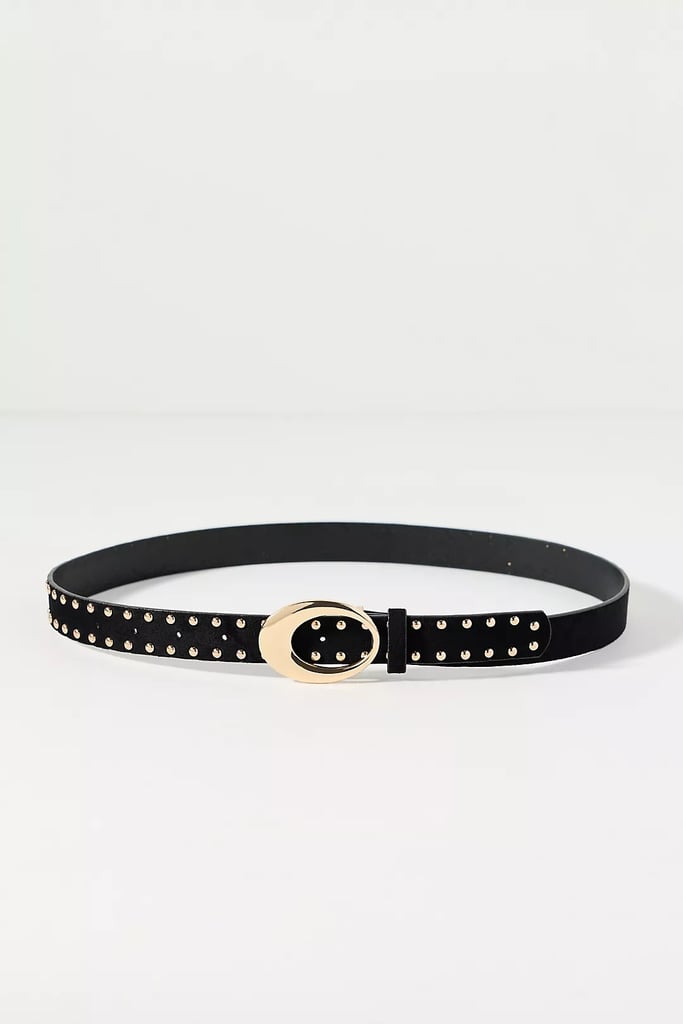 8 Other Reasons Studded Oval Buckle Belt ($40, originally $58)
Continuing the western theme across Anthropologie's fall collection, this studded belt feels equal parts Americana and edgy. The black leather base and golden studs yield an easy-to-style accessory that seamlessly pairs with your favorite denim.