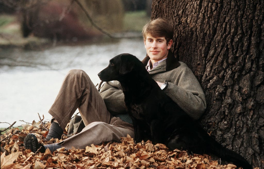 A young Prince Edward posed with his Black Labrador, Frances, in the grounds of Buckingham Palace back in 1982.