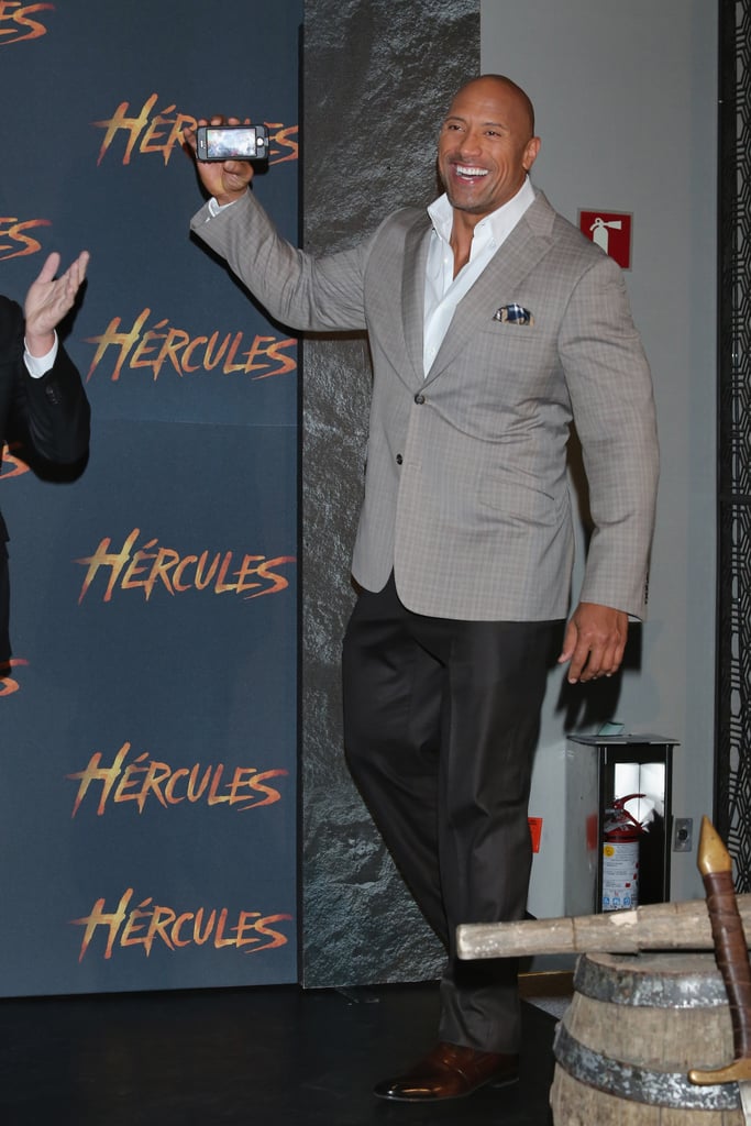 The Rock snapped photos at an event for Hercules in Mexico City on Monday.