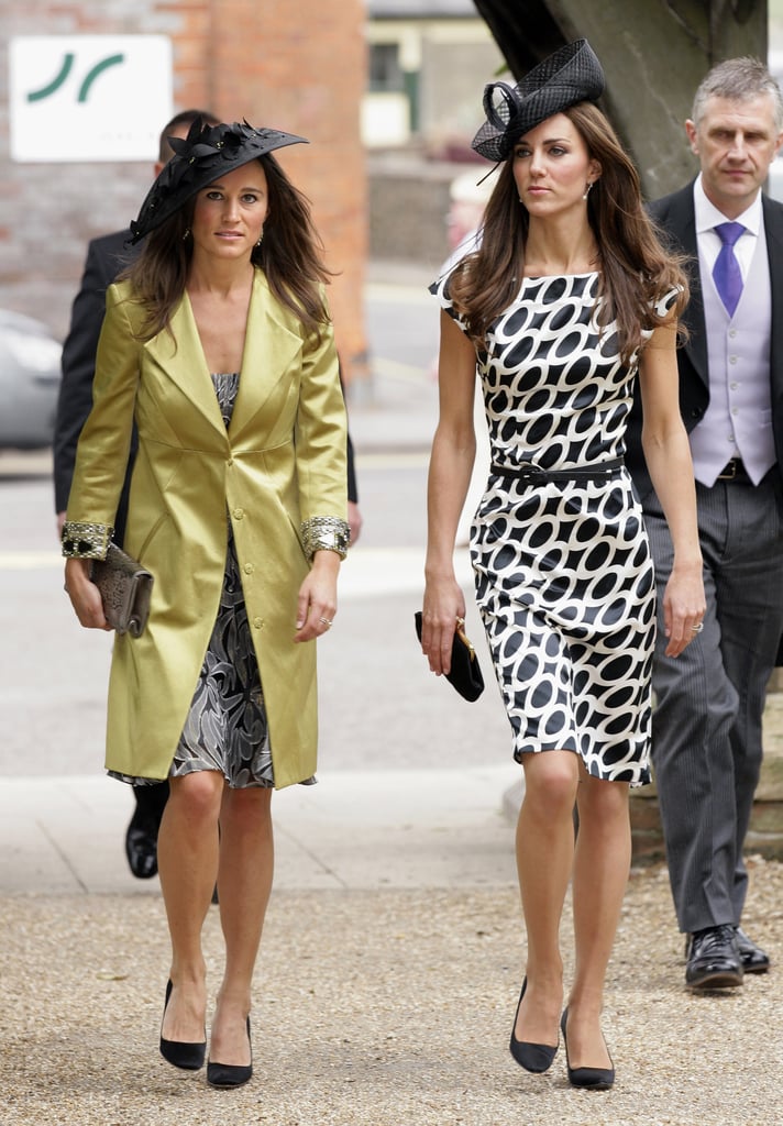 Sisters Kate and Pippa Middleton attended a friend's wedding in equally stylish black hats in June 2011.