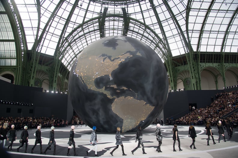 Models walked around a giant globe for Fall 2013.