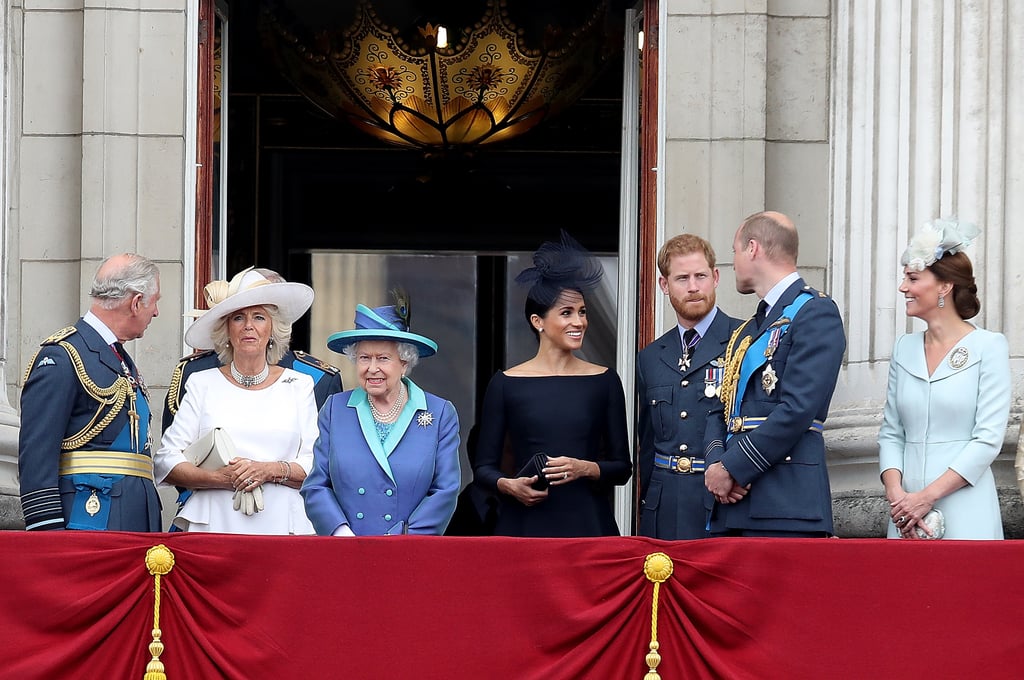 William turned to a smiley Meghan on the balcony of Buckingham Palace in July.