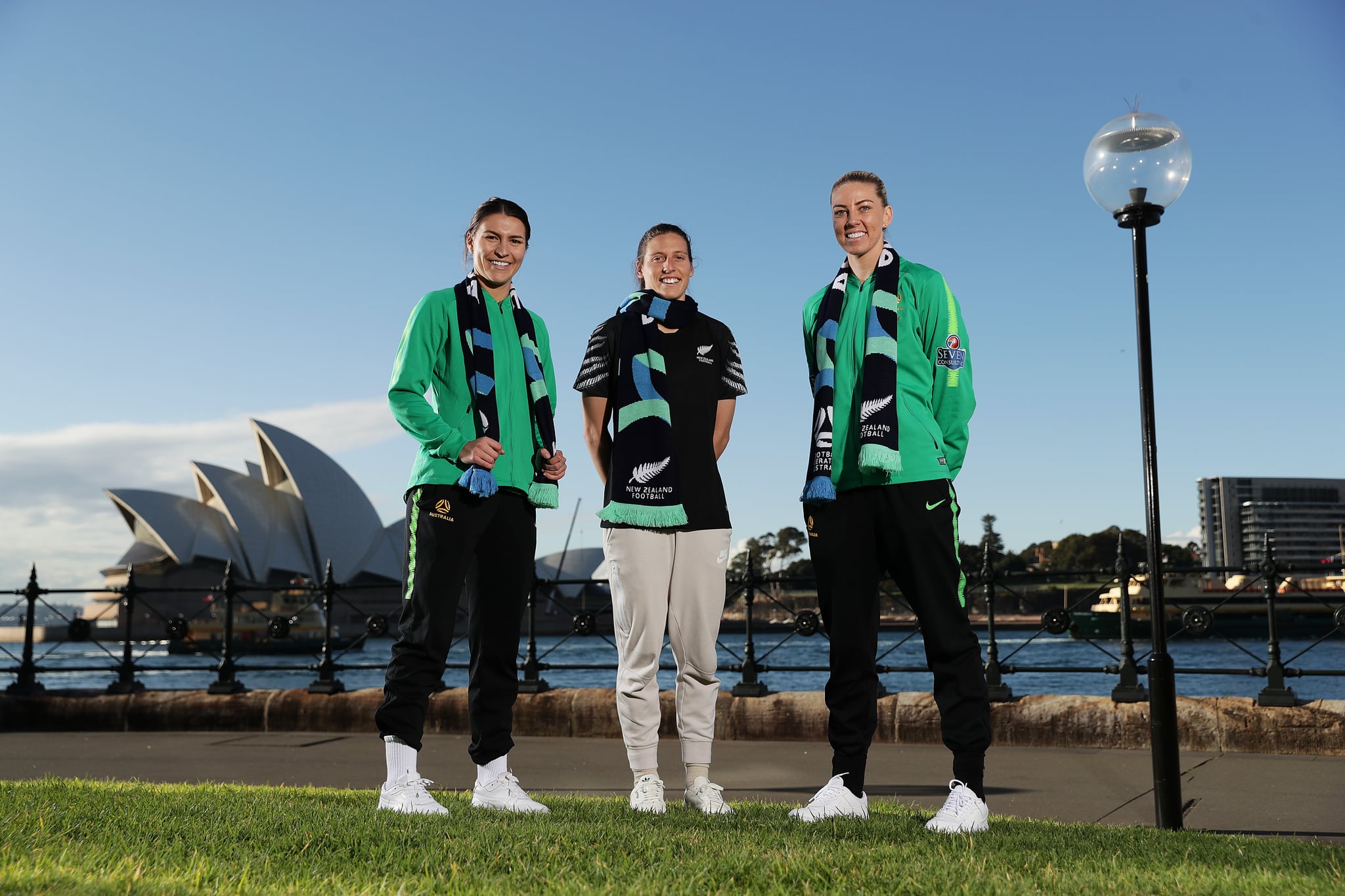 SYDNEY, AUSTRALIA - JUNE 26: Alanna Kennedy and Steph Catley of the Matildas pose with Football Fern, Rebekah Stott during a media opportunity following the successful bid for Australia & New Zealand to host the 2023 FIFA Women's World Cup, at Hickson Road Reserve, The Rocks on June 26, 2020 in Sydney, Australia. (Photo by Mark Metcalfe/Getty Images)