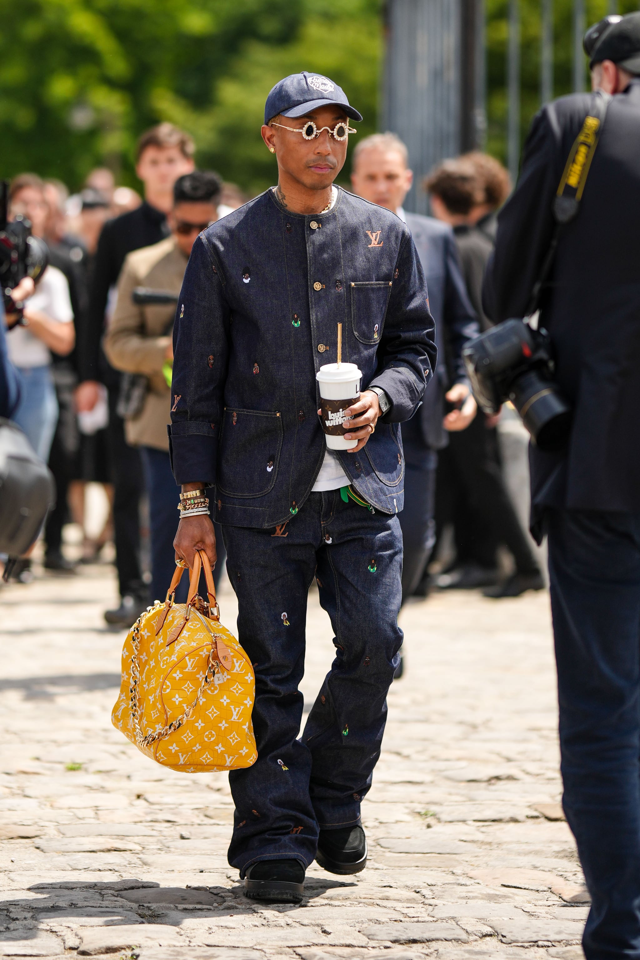 Male Celebrities Wearing Designer Bags