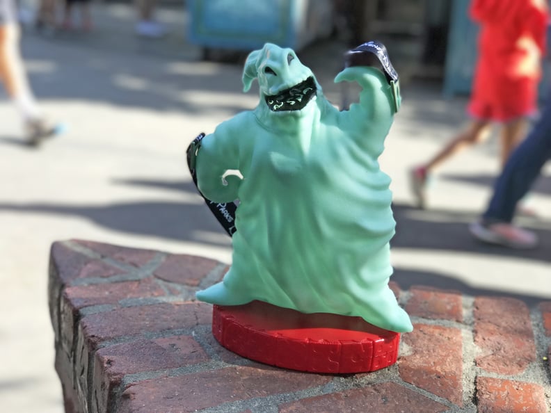 You can snack on popcorn out of Oogie Boogie buckets.