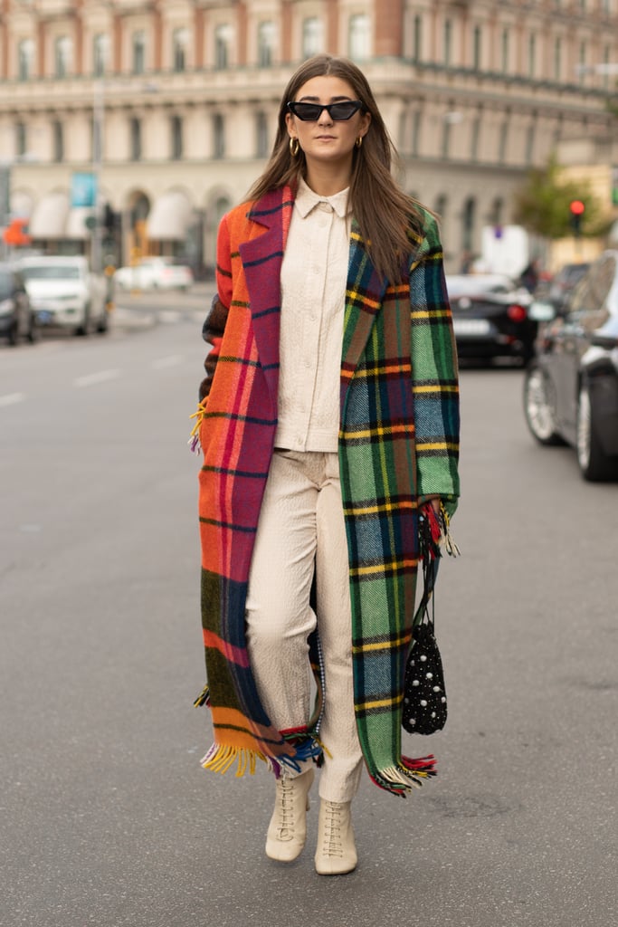 Keep the rest of your look simple, but make a statement with a plaid coat.