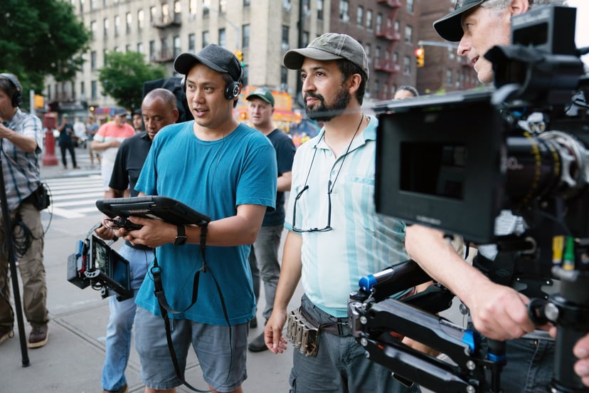 IN THE HEIGHTS, from left: director Jon M. Chu, Lin-Manuel Miranda, on set, 2021.  ph: Macall Polay / Warner Bros. / courtesy Everett Collection