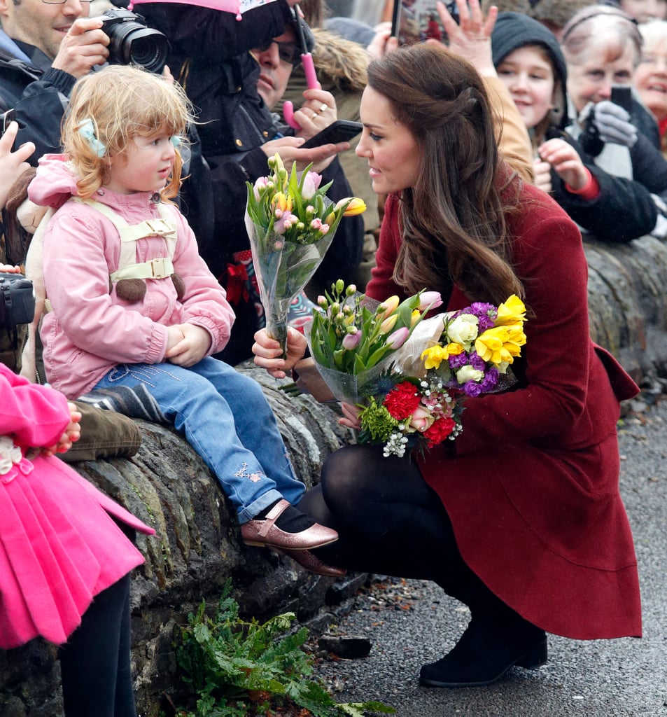 Kate received flowers from a young girl when she visited the Caerphilly Family Intervention Team in February in Caerphilly, Wales.