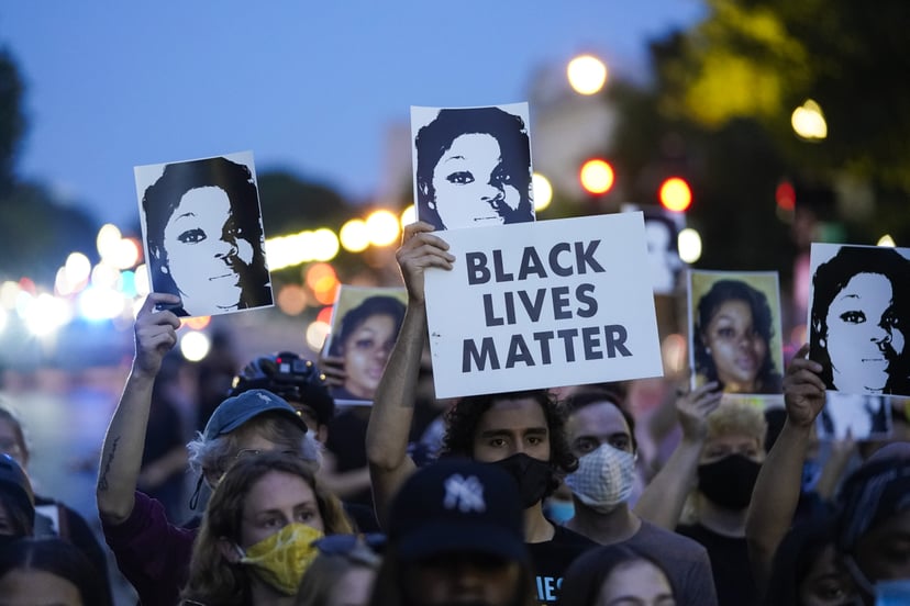 WASHINGTON, DC - SEPTEMBER 23: Demonstrators march along Constitution Avenue in protest following a Kentucky grand jury decision in the Breonna Taylor case on September 23, 2020 in Washington, DC. A Kentucky grand jury indicted one police officer involved