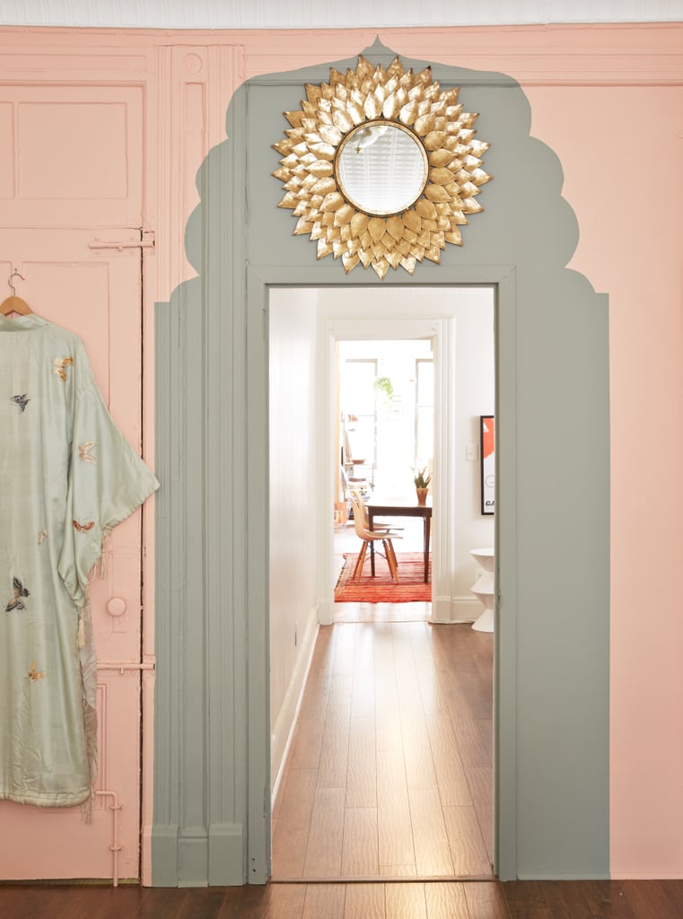 Step 3: Finishing Touches
Adding a couple of key accessories to the room is the secret to elevating this design from crafty DIY to chic decor. To help integrate the painted archway into the room, I centered a gold starburst mirror above the door. Then I placed a potted cactus off to one side and hung a vintage kimono off the other. It doesn't take much, but backing up bold design statements with the right accents is crucial.
Check out One Kings Lane to shop the look! Step 3: Finishing Touches
Adding a couple of key accessories to the room is the secret to elevating this design from crafty DIY to chic decor. To help integrate the painted archway into the room, I centered a gold starburst mirror above the door. Then I placed a potted cactus off to one side and hung a vintage kimono off the other. It doesn't take much, but backing up bold design statements with the right accents is crucial.
Check out One Kings Lane to shop the look!