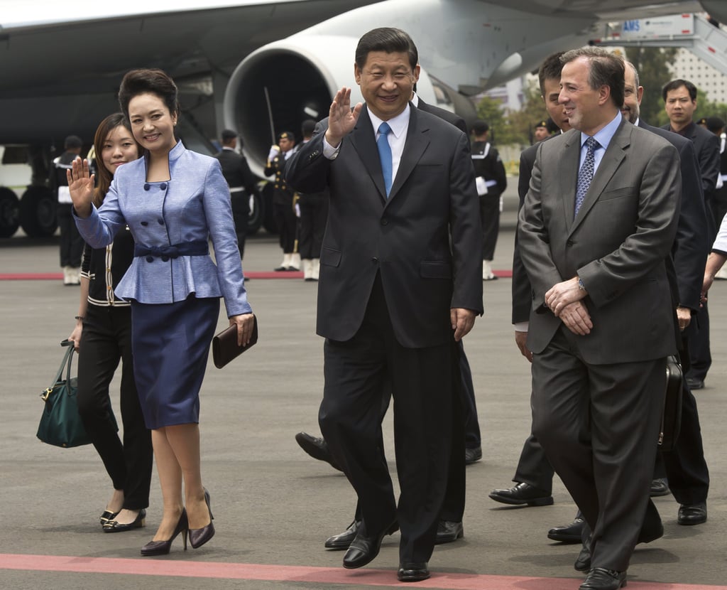 Ms. Liyuan Had a Handle on Peplum in 2013