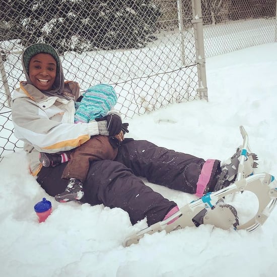 Mom Breastfeeding While Snowshoeing