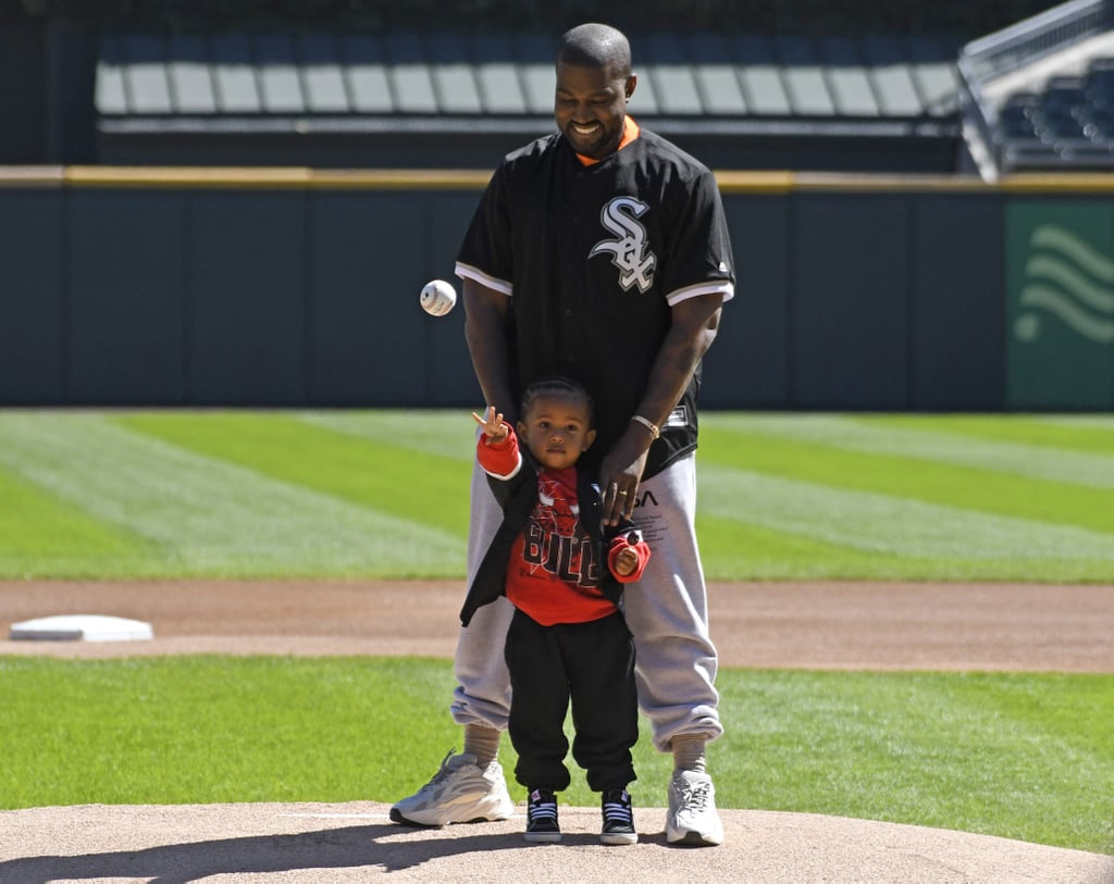 Kanye West and Saint West Throw First Pitch at Baseball Game