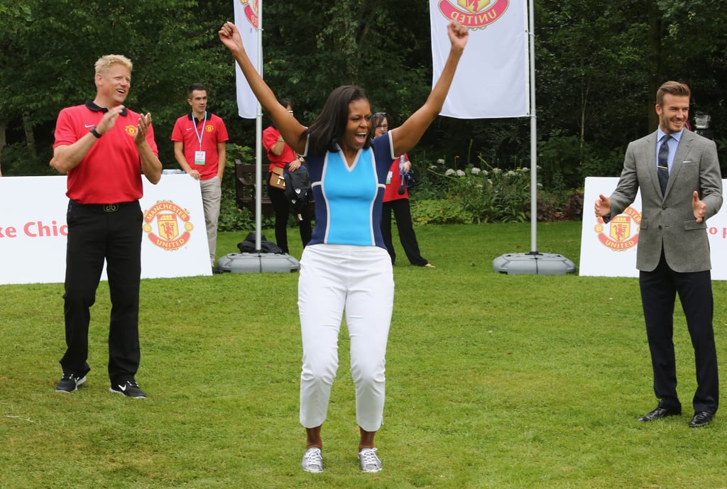 Celebrating next to some soccer player at a 2012 Let's Move event in London.