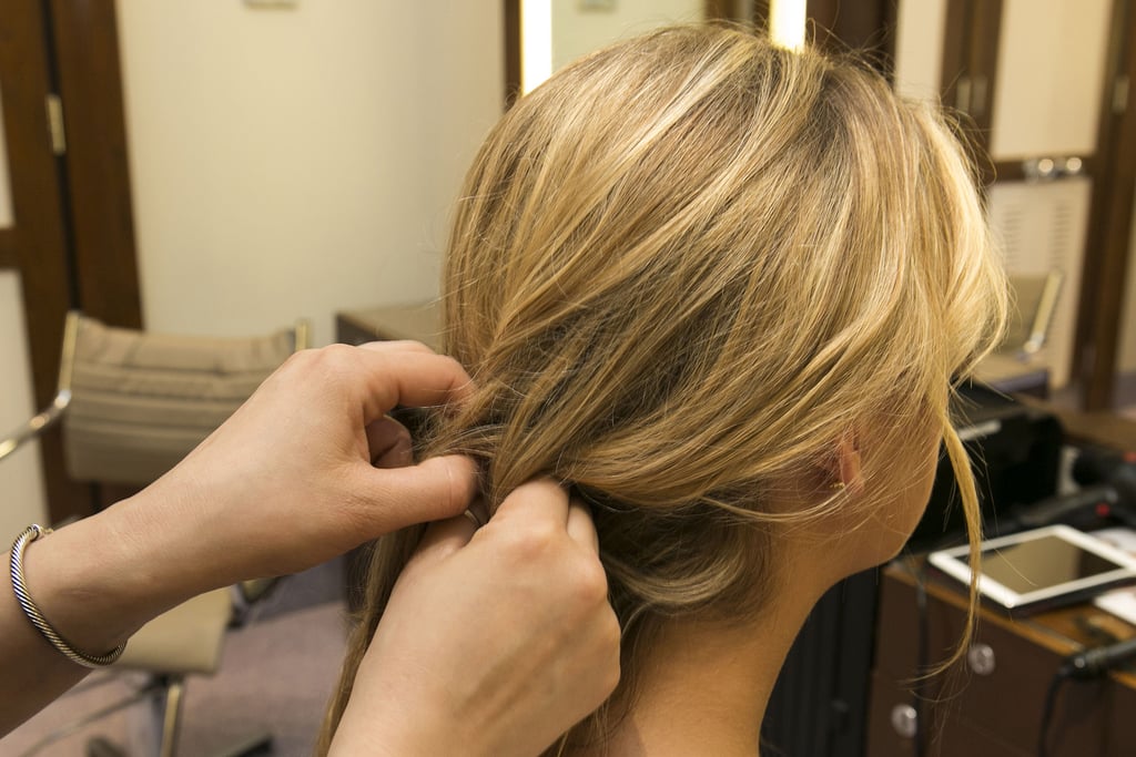 Next, the advanced DIY braider can create a loose french braid starting behind the opposing ear to help hold the sideswept hair in place. For beginners, try a regular braid or just twist hair over to help keep it in place.