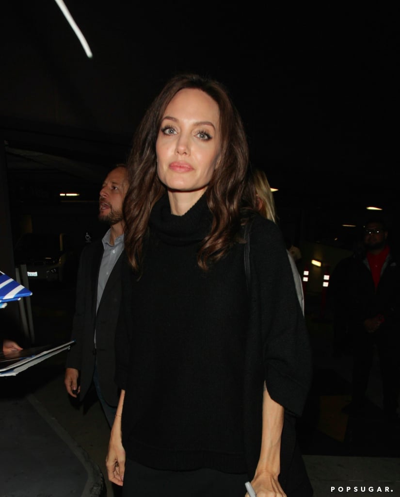 Angelina Jolie Wearing Black Suede Boots