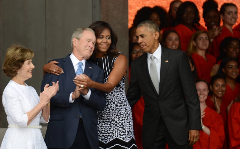 Sharing embraces at the National Museum of African American History and Culture's dedication in 2016