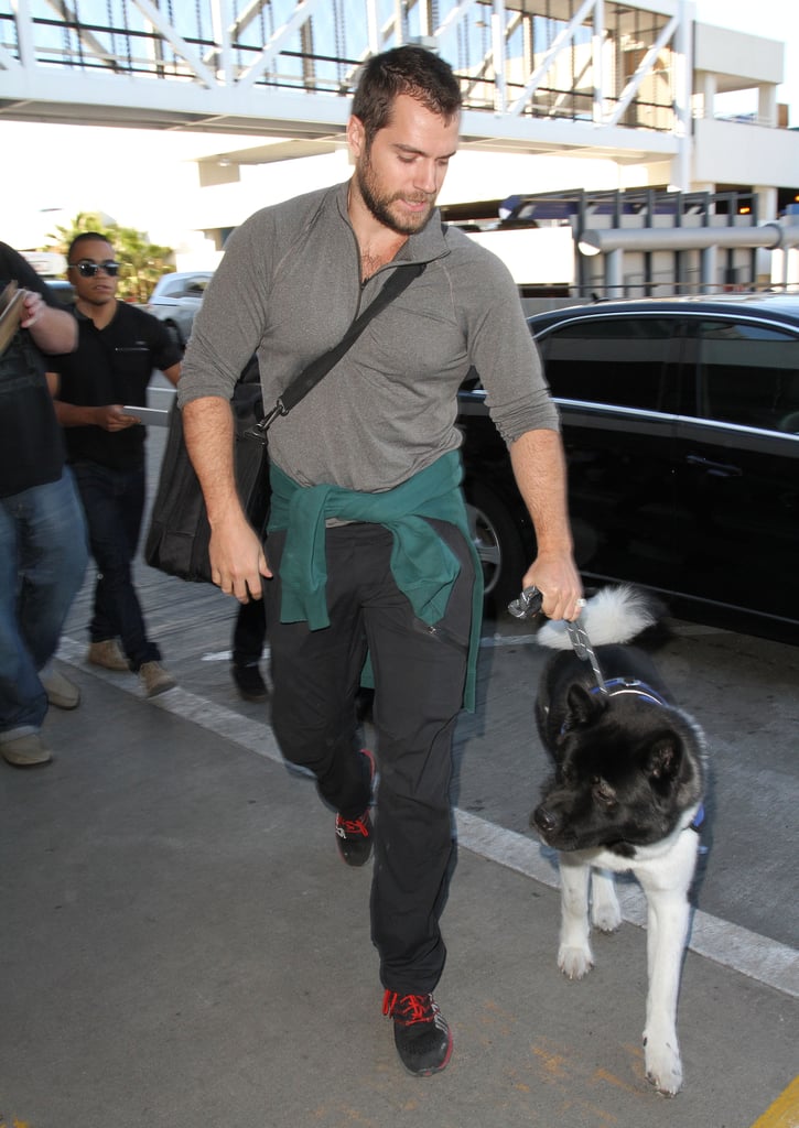 Henry Cavill caught a flight with his best friend at LAX on Friday.