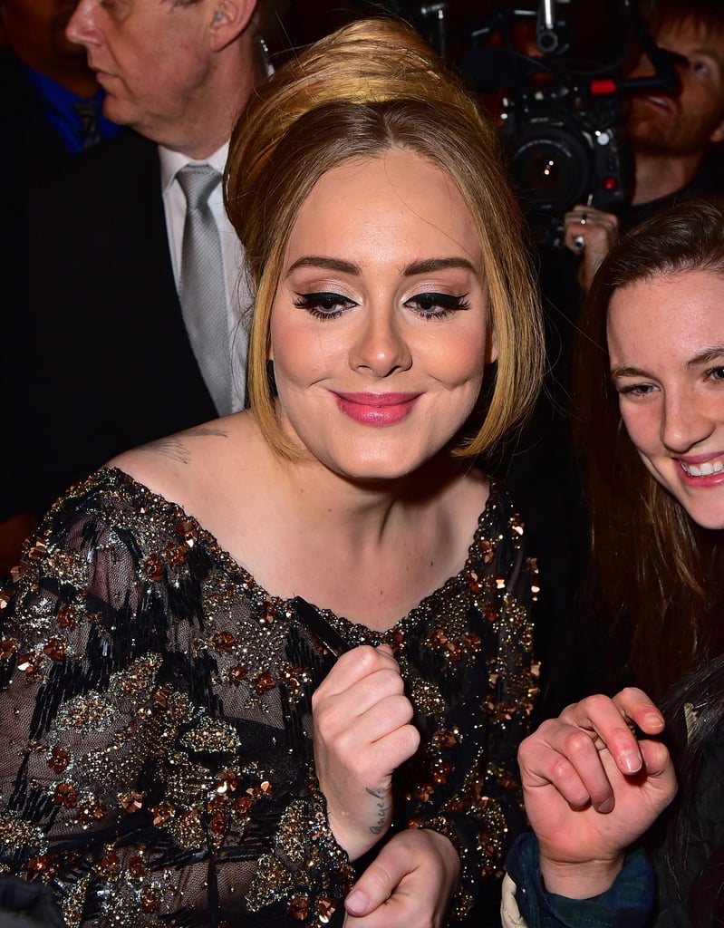 Adele Poses With Fans Outside Radio City Music Hall 2015
