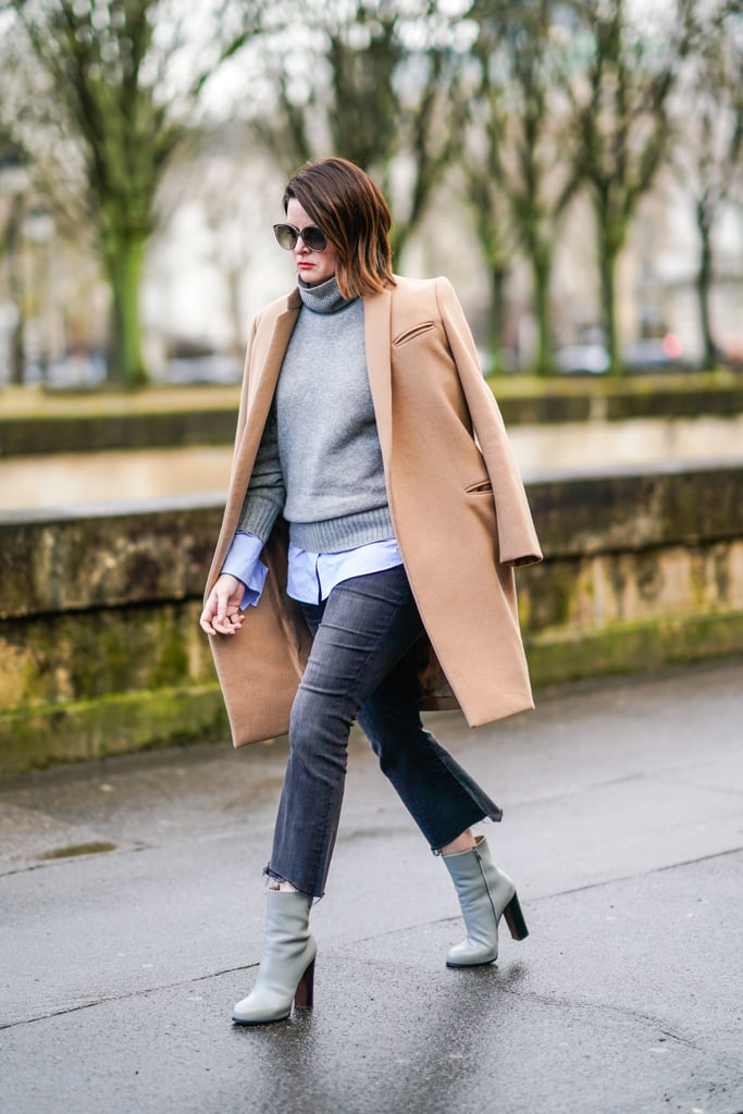 In Chic, Muted Shades With a Camel Coat, a Grey Polo Neck, and Boots