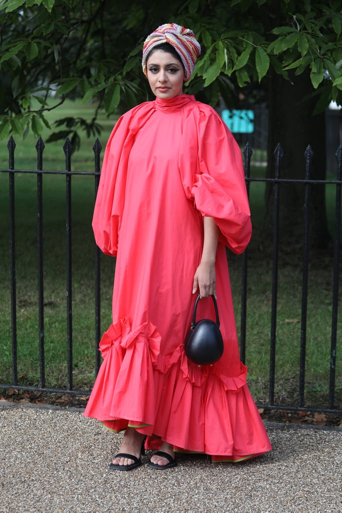This brilliant berry-hued dress is a statement all on its own.