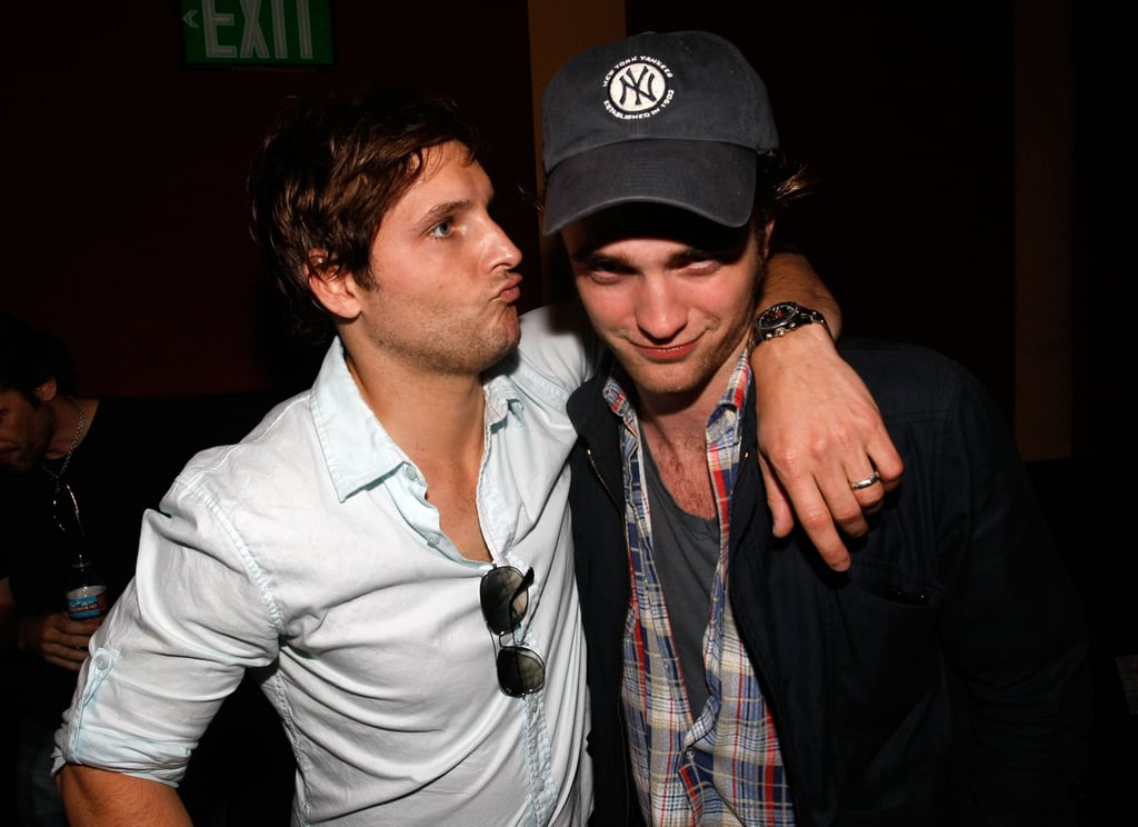 Peter Facinelli leaned in for a kiss from Robert Pattinson during a Twilight event in 2009.