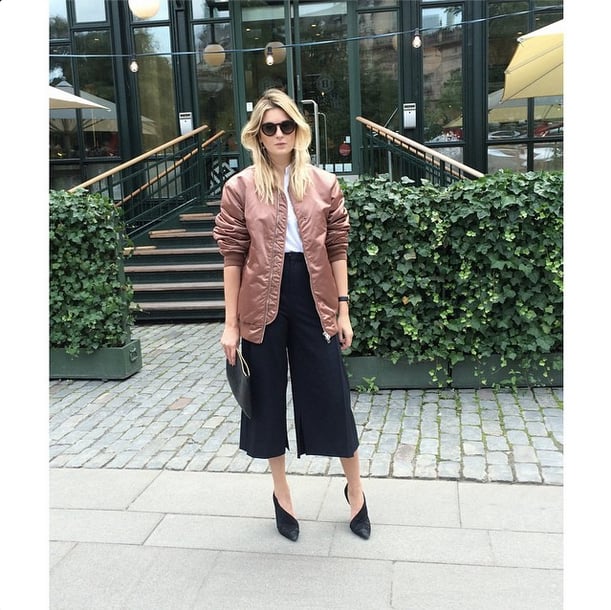 A striking, somewhat flashy bomber is going to be the coat of Fall, lending your outfits a sporty touch. Throw it over your tailored, more conservative pieces for the ultimate cool-girl look.
Source: Instagram user camtyox
