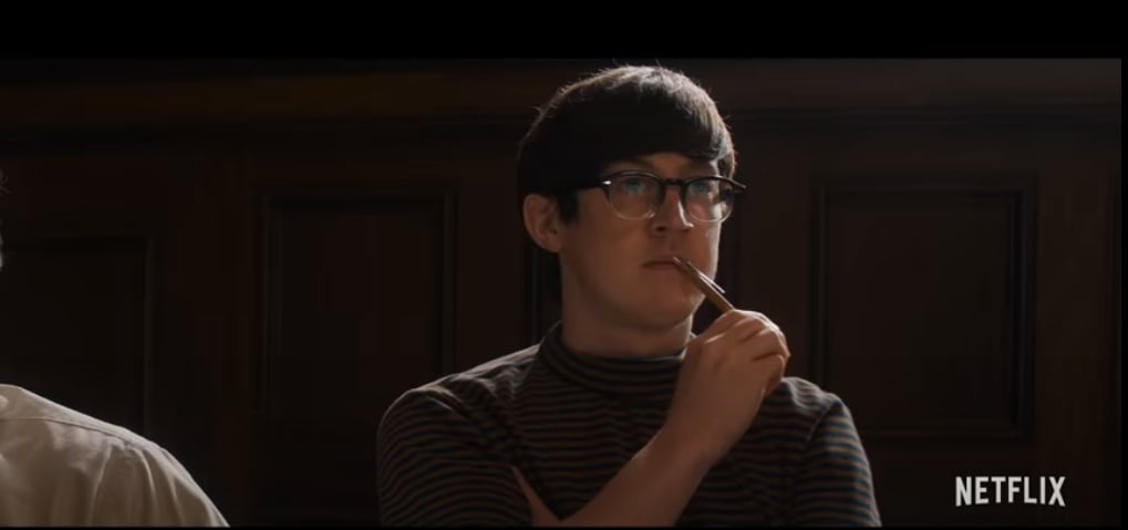 Alex Sharp as Rennie Davis