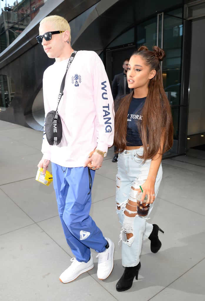 In early July, Ariana and Pete were spotted in NYC in casual graphic tees, Ariana's by Brandy Melville. She wore distressed Carmar denim and stood tall in Sergio Rossi platform boots.