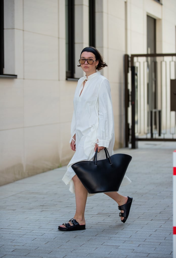 Wear an unstructured shirtdress with an oversize bag and slide sandals.