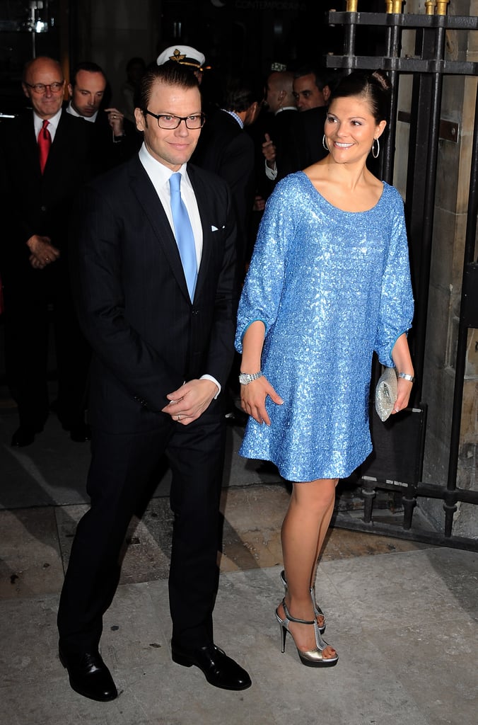 Crown Princess Victoria of Sweden wearing a blue sequined dress.