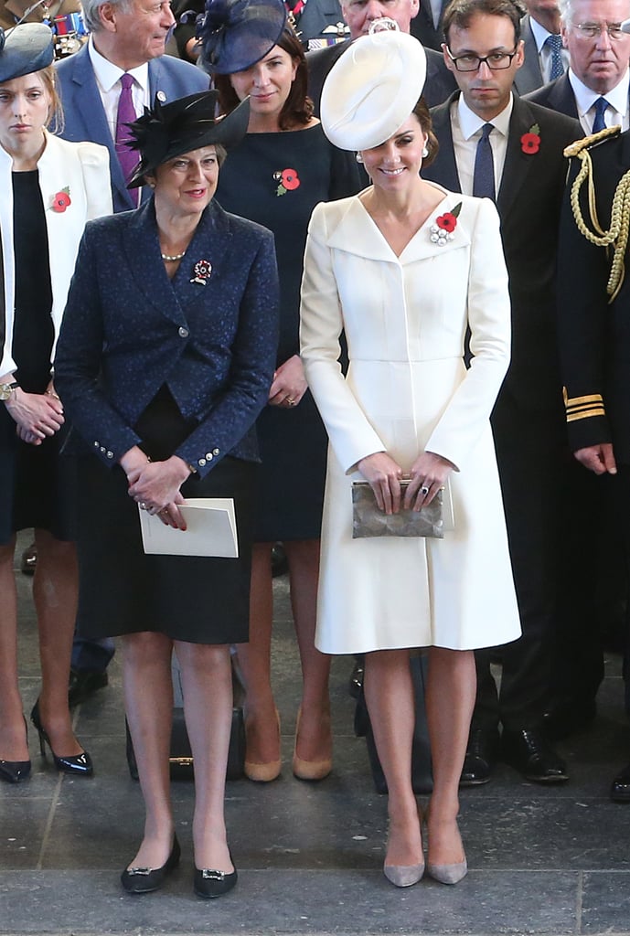 Kate Middleton wore an Alexander McQueen coat and carried a clutch by Anne Grand-Clément during a commemoration event on July 2017.