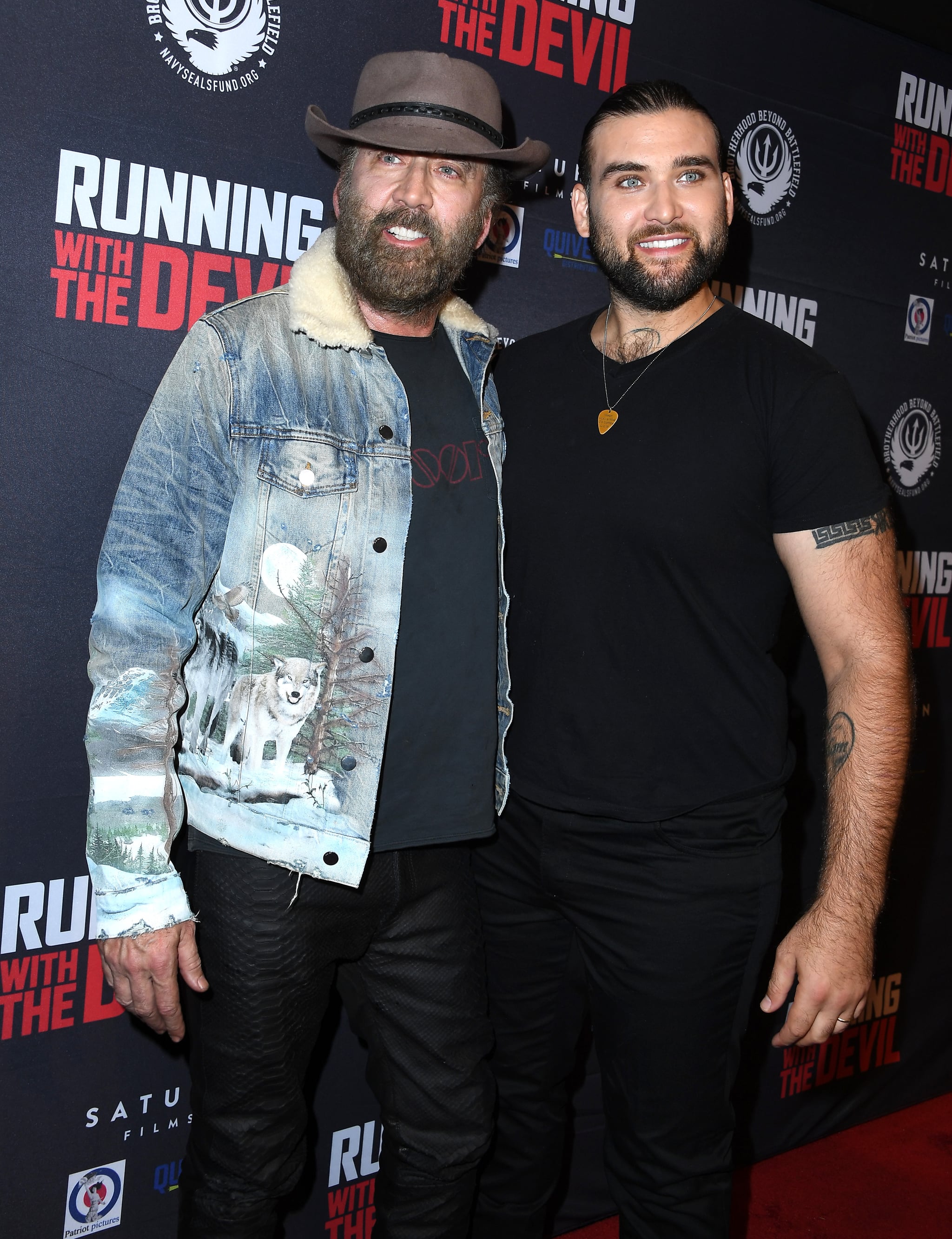 BEVERLY HILLS, CALIFORNIA - SEPTEMBER 16: Nicolas Cage and son Weston Coppola Cage arrives at the Premiere Of Quiver Distribution's 