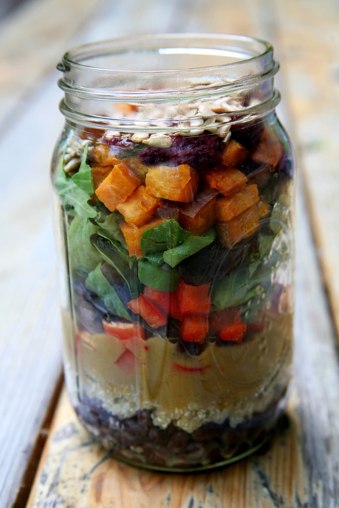 Lunch: Roasted Sweet Potato and Quinoa Salad

1/2 cup black beans
1/2 cup cooked quinoa
Mango balsamic vinaigrette
1/4 red pepper, diced
2 cups greens
1 small sweet potato, diced and roasted
1 tablespoon dried cranberries
1 tablespoon salted sunflower seeds
Total: 484 calories, 12.6 grams of fiber, 15.8 grams of protein

Afternoon Snack: Hummus and Carrots

1 tablespoon hummus: 35 calories, .5 grams of fiber, 1 gram of protein
8 baby carrots: 28 calories, 1.4 grams of fiber, .5 grams of protein
Total: 63 calories, 1.9 grams of fiber, 1.5 grams of protein