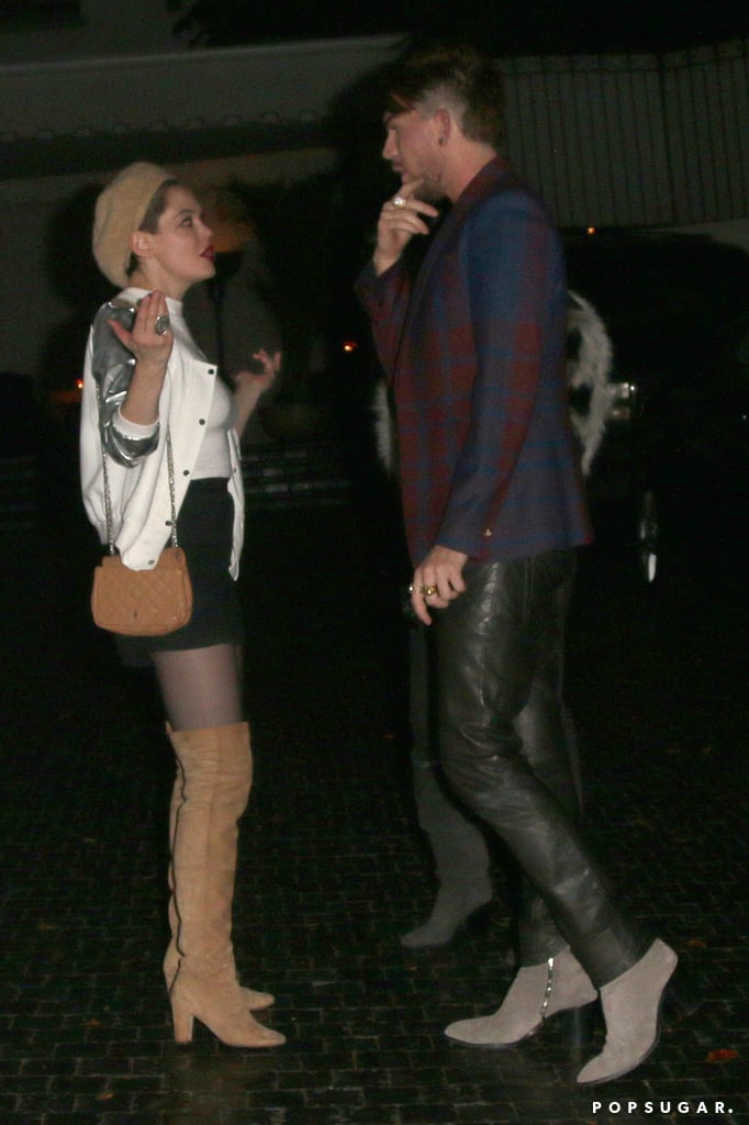 Adam Lambert and Rose McGowan caught up outside the Chateau Marmont in LA on Friday.