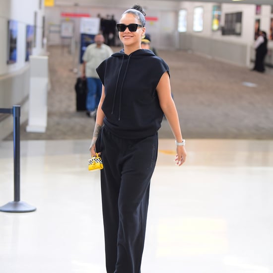 Rihanna Carrying Tiny Yellow Taxi Bag at Airport