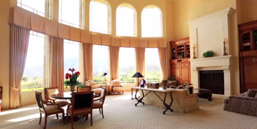 Natural light fills every inch of the grand living room.