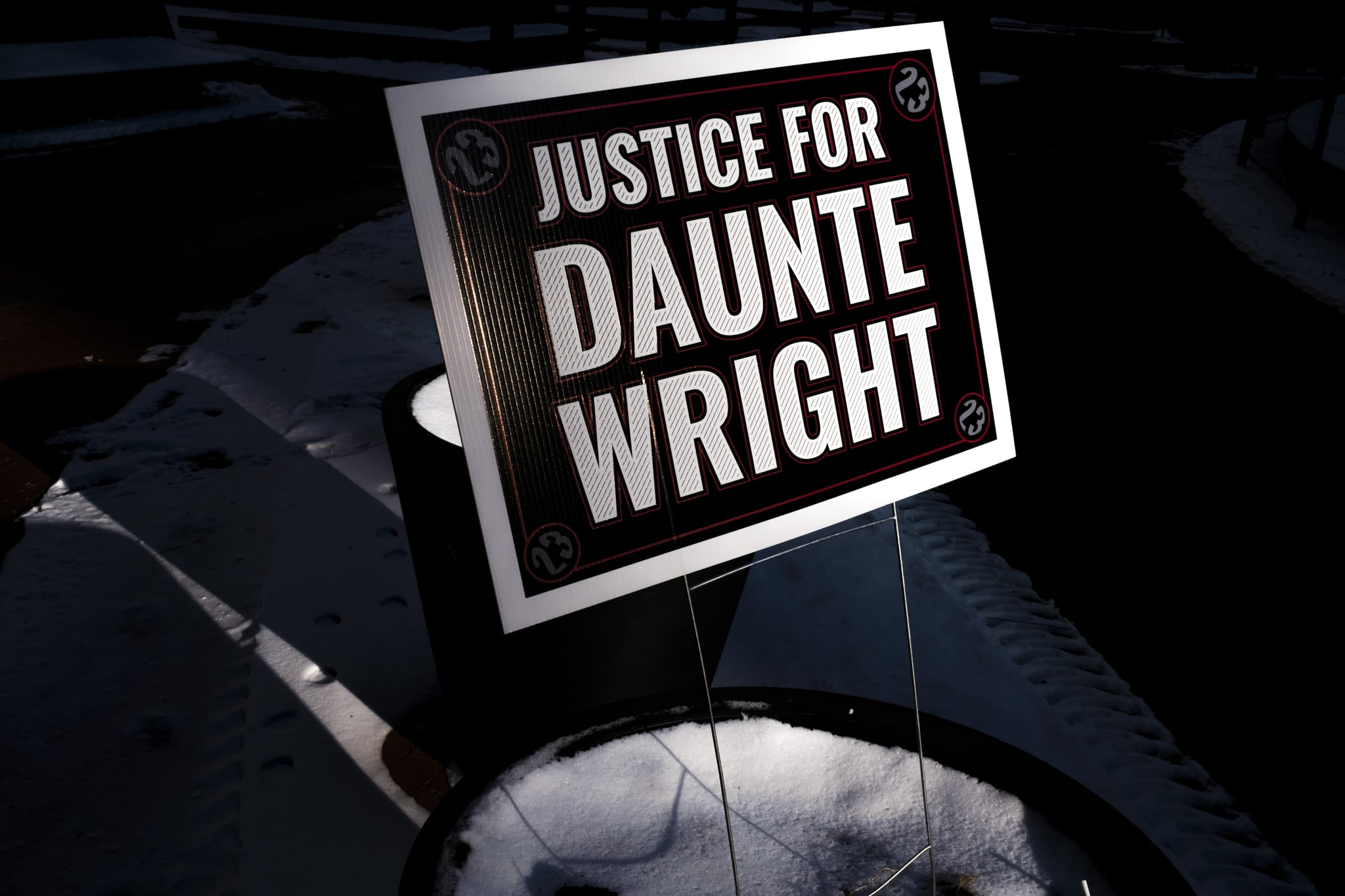 MINNEAPOLIS, MN - DECEMBER 23: A sign reading Justice for Daunte Wright is placed outside the Hennepin County Government Centre on December 23, 2021 in Minneapolis, Minnesota. Jury deliberations are ongoing in the trial of former Brooklyn Centre police officer Kim Potter, who is charged with manslaughter in the April 2021 shooting death of Daunte Wright. Potter says she thought she was using her Taser when she shot Wright with her handgun. (Photo by Stephen Maturen/Getty Images)