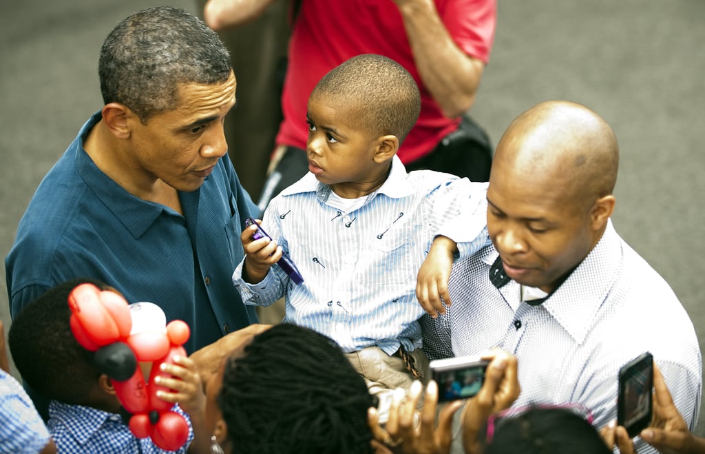 Barack got close with some people in the crowd at the 2010 White House party.