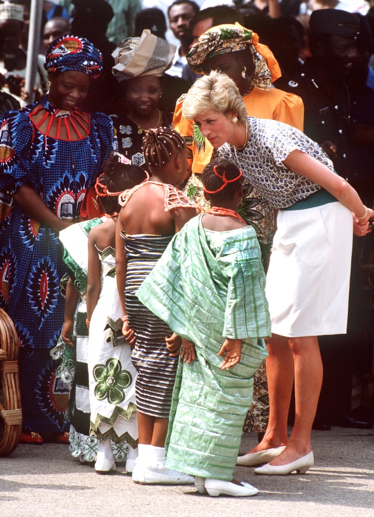 In March 1990, Diana talked with a group of young girls while ...
