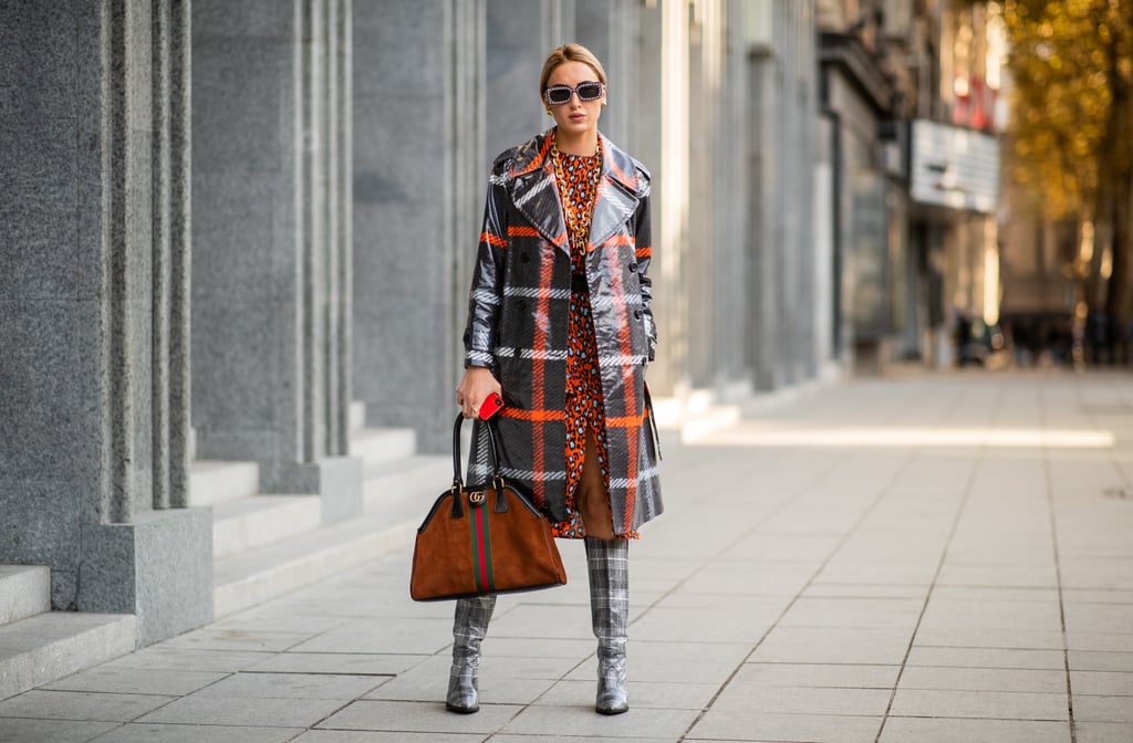 Style a Midi Dress With a Vinyl Trench Coat and Thigh-High Boots