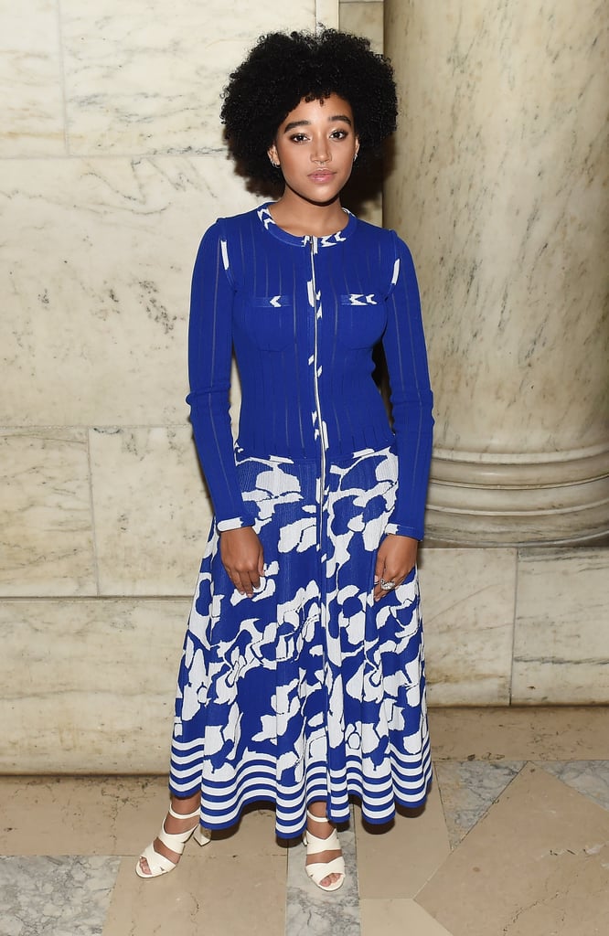 Just as Easily, She'll Switch Into a More Feminine Outfit Like This Floral Dress